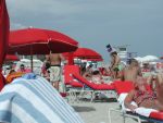 The beach was packed with people...